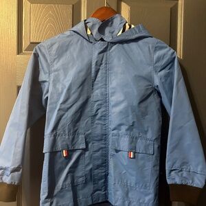 Cute Blue Raincoat never worn sized 140 cm